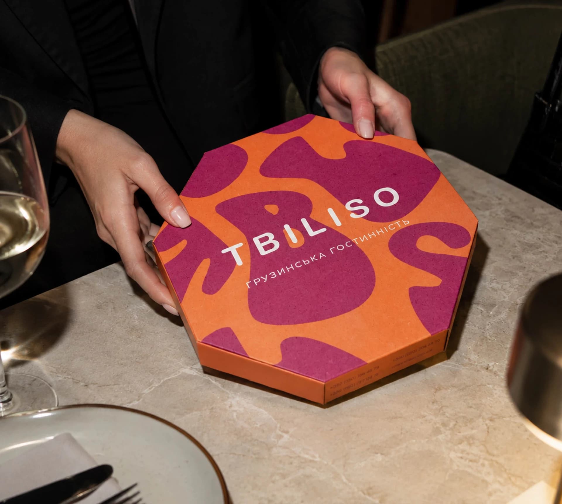 Packaging with branded tape